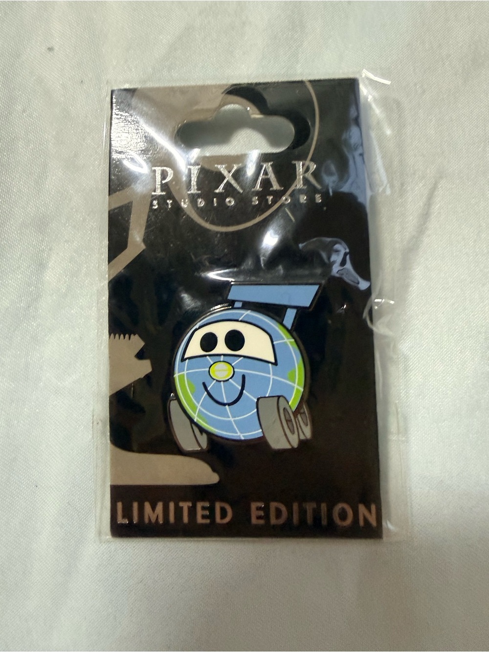 Pixar Studio Stores Limited Edition Blue & Green Globe Character Pin